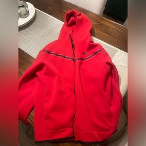 Red Nike tech fleece